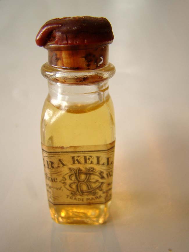 A fine and rare unopened bottle of whale oil circa 1875 distributed by Ezra Kelley (1798-1895) of New Bedford, Mass.